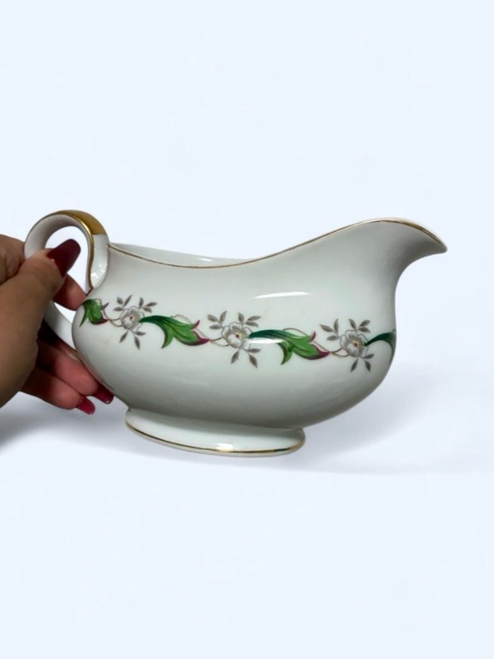 Elegant White Porcelain Gravy Boat with Green Floral Trim